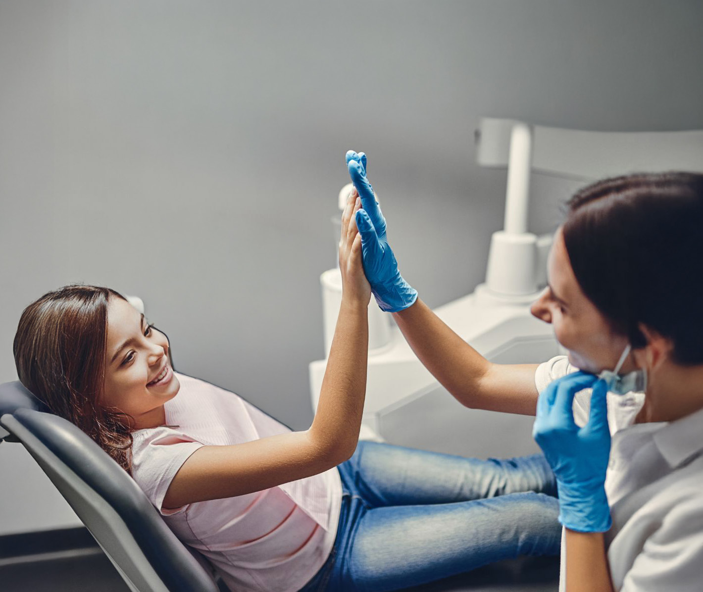 Dentist and patient sharing a moment of connection and trust